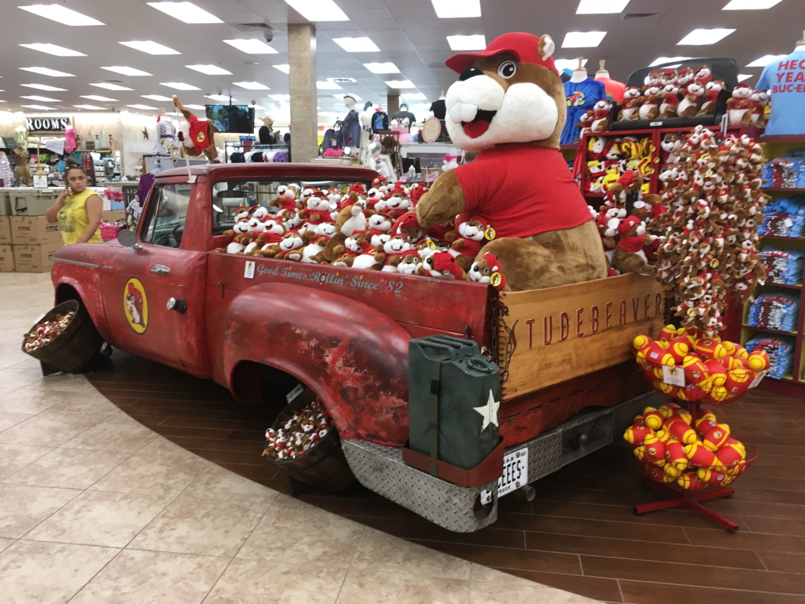 A pickup truck full of Buc-ee's merchandise.